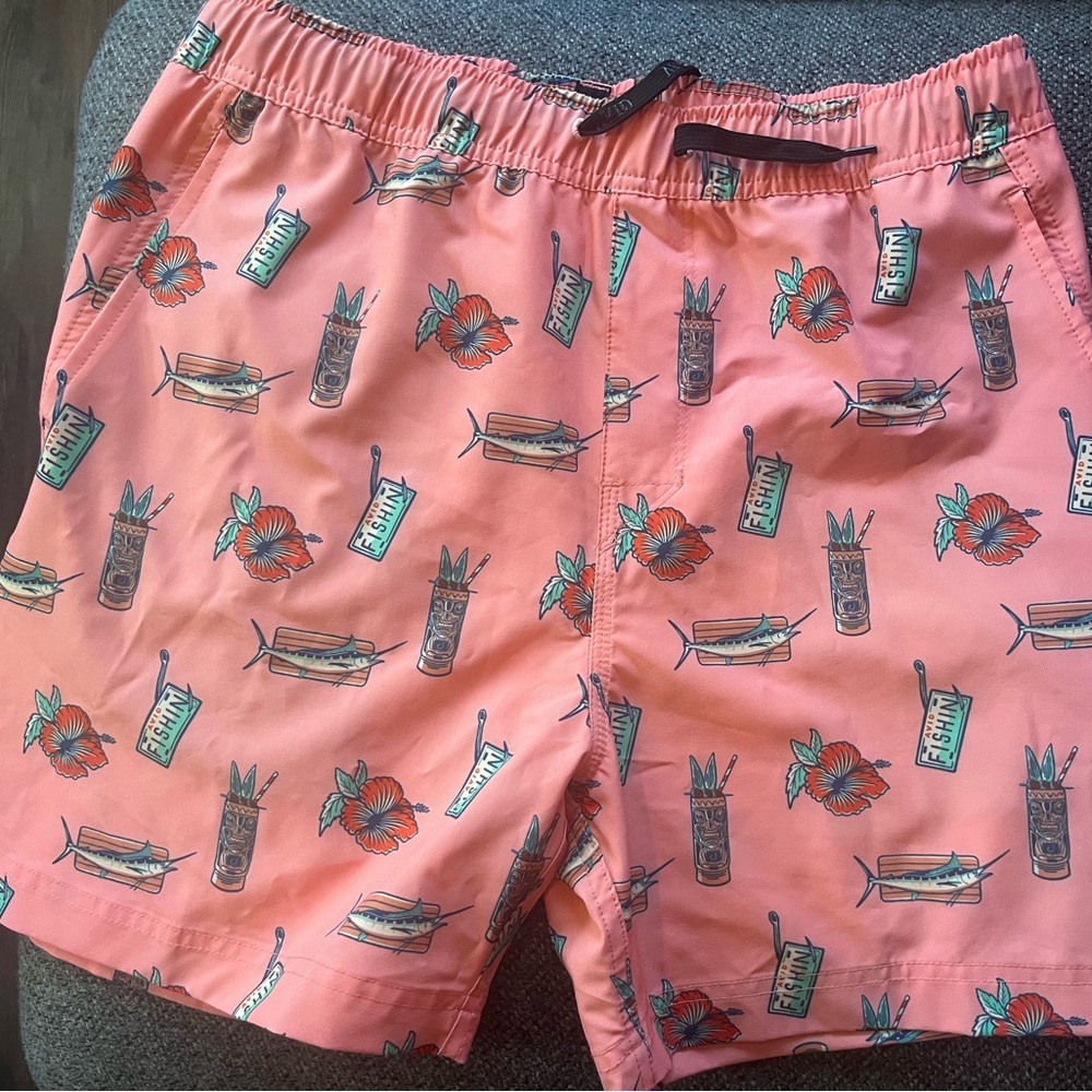 Orange tiki board shorts